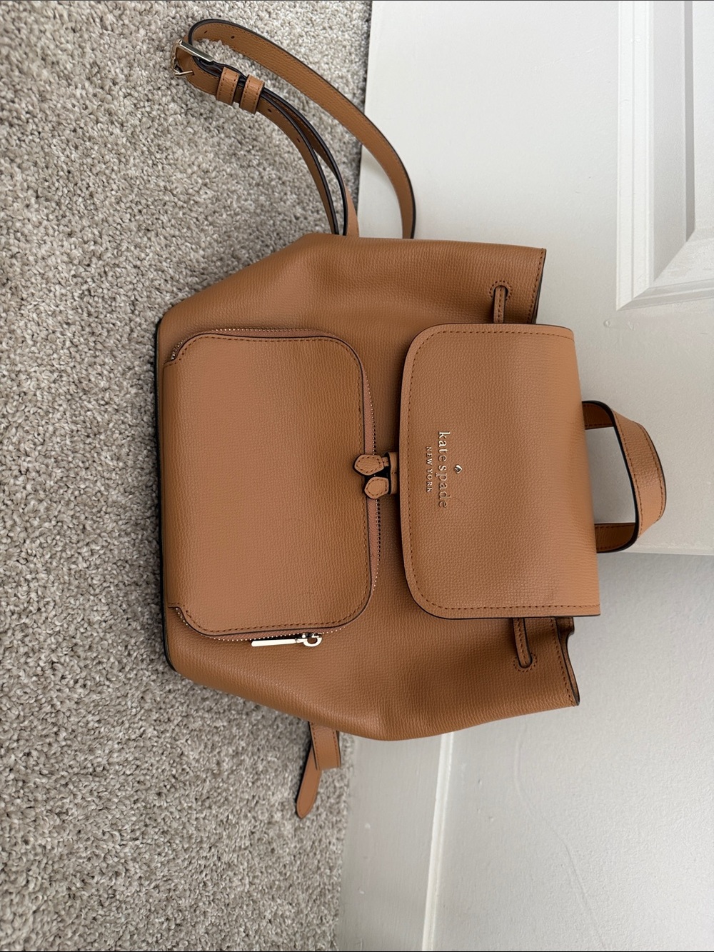 kate spade tan pebbled leather backpack with front flap pocket